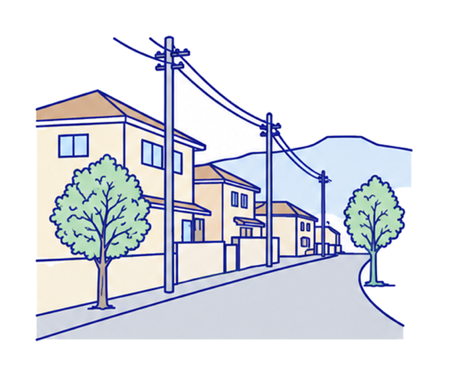 街道沿いの低い家並みと坂道の線画